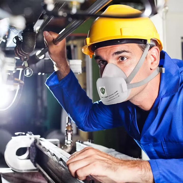 Compact protective gas mask for chemical spraying and handling.